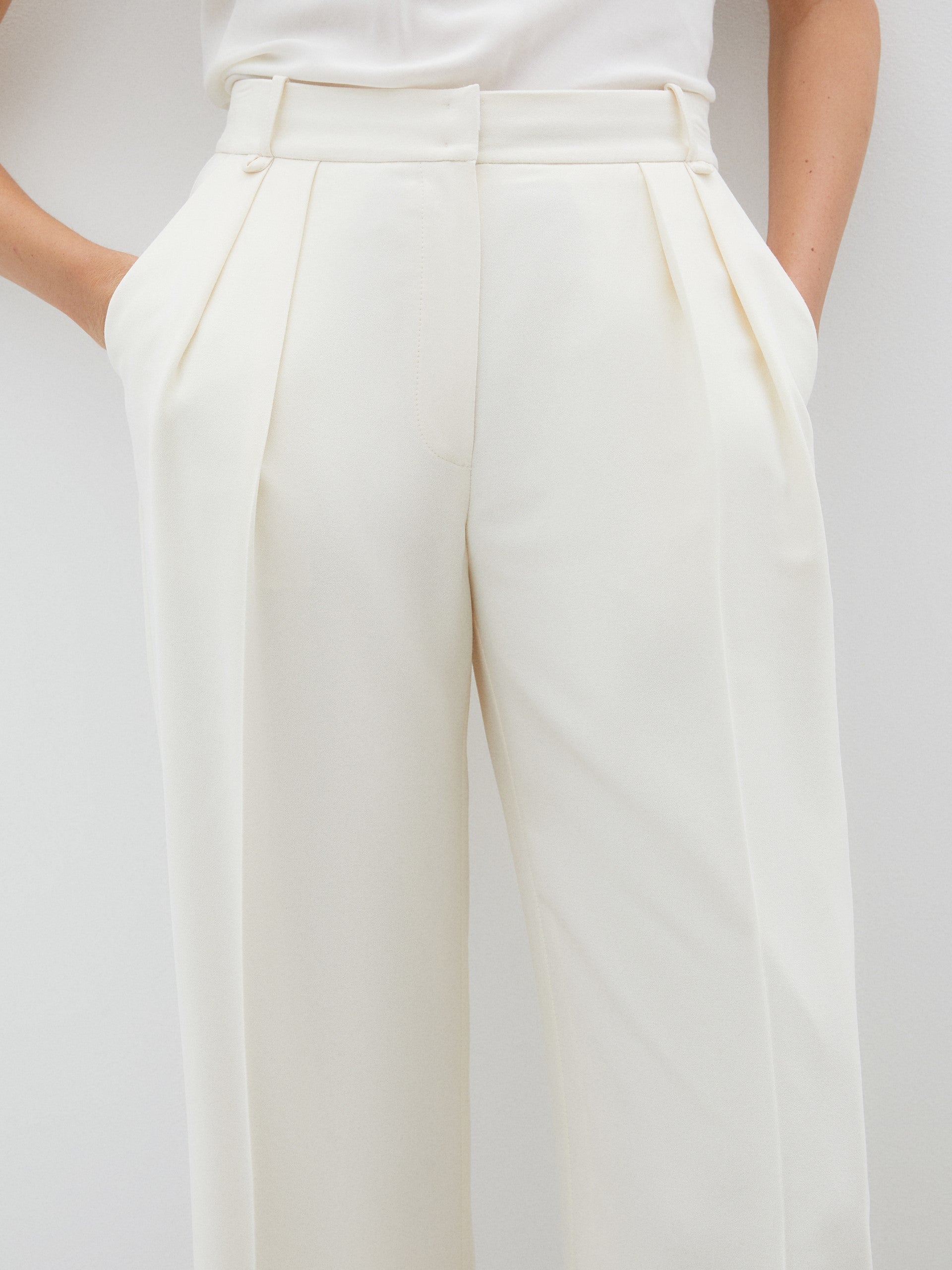 Ecru Trousers with Side Pockets and Pleat Detail